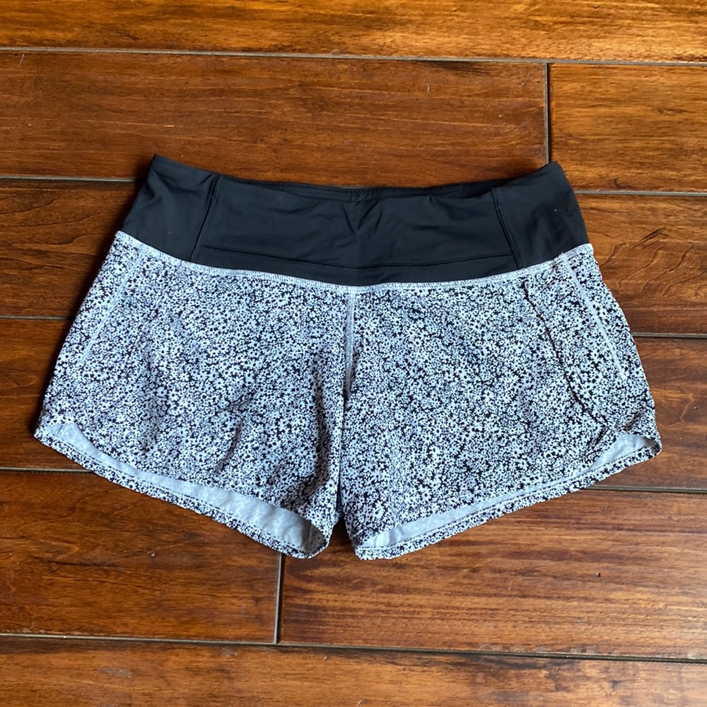 Lululemon womens short. Black and white flower print. Removed tag. Size 4
